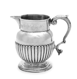 * A George III Silver Creamer, Maker's Mark Obscured, London, 1814, the lower half of the body with ribbed decoration.