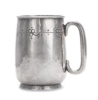 A George V Silver Mug, Liberty & Co., Birmingham, 1914, in the Arts & Crafts taste, with spot-hammered surfaces and stylized cha