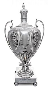 An English Silver-Plate Coffee Urn, , of baluster form with top finial, the base with engraved inscription 1958 Heart Award/ to