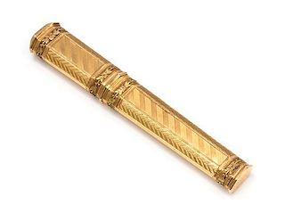 A Continental Gold Etui, Circa 1800, with engine-turned engraving separated by bands of leaves.