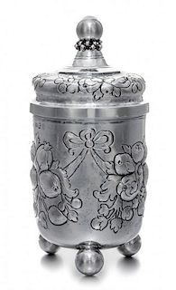 A German Silver Covered Jar, B. Neresheimer & Sohne, Hanau, 19th/20th Century, of cylindrical form, having foliate and berry dec