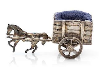A German Silver Pin-Cushion, Hanau Marks, 19th Century, in the form of a horse pulling a cart.