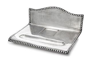 * A Swedish Silver Inkstand, G.B. Hallberg, Stockholm, 1924, of rectangular form with a domed backplate, the spot-hammered surfa