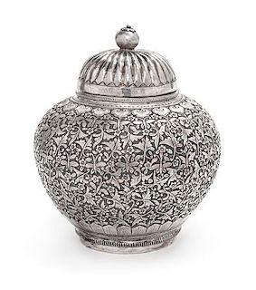 A Chinese Silver Covered Jar, , the underside chased with two-character maker's mark Li Zhen, the other wen yin (fine silver).