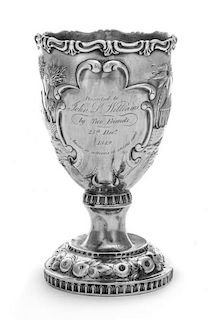 An American Silver Chalice, Canfield Bros. & Co., Baltimore, MD, 1849, the body worked to depict a tropical garden scene and an