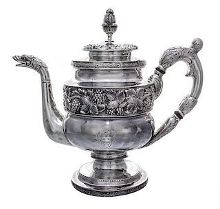 An American Silver Teapot, S. Kirk & Son, Baltimore, MD, 19th Century, having a foliate finial, the lid and body decorated with
