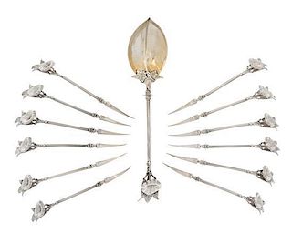 A Cased American Silver Nut Service, Gorham Mfg. Co., Providence, RI, Circa 1865, comprising twelve picks and a serving spoon in