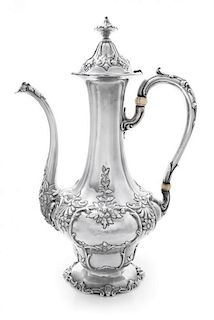 * An American Silver Coffee Pot, Gorham Mfg. Co., Providence, RI, the body worked with rocaille, floral, foliate and C-scroll mo