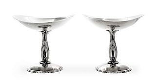 * A Pair of American Silver Compotes, Cellini Craft, Ltd., Chicago, IL, 1940, each of oval boat form, raised on an openwork leaf