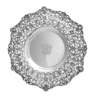 * An American Silver Serving Platter, Shreve & Co., San Francisco, CA, the border worked with floral and foliate motifs on a pie