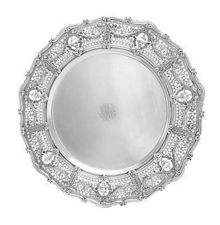 * An American Silver Serving Platter, Shreve & Co., San Francisco, CA, having an S-scroll decorated rim, the border worked to sh