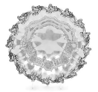 An American Silver Center Bowl, Shreve & Co., San Francisco, CA, having a shamrock decorated border and a lobed body.