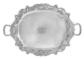 An American Silver Two-Handled Serving Tray, Jennings Silver Co., Irvington, NJ, the rim decorated with rocaille, floral swag an