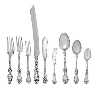 An American Silver Flatware Service, Reed and Barton, Taunton, MA, Les Cinq Fleurs pattern, comprising: 8 dinner knives 6 lunche
