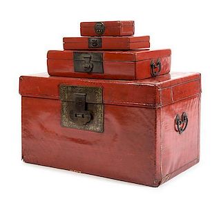 * A Set of Four Red Lacquer Hinged Boxes Largest: height 5 x width 19 1/2 x depth 14 1/2 inches.