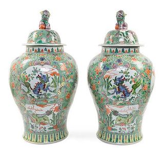 A Large Pair of Chinese Export Famille Verte Porcelain Baluster Jars and Covers Height 31 1/2 inches.