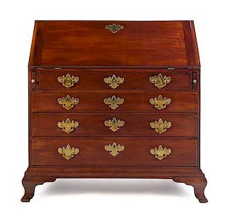 A Chippendale Mahogany Slant-Front Desk Height 41 5/8 x width 39 5/8 x depth 22 3/4 inches.