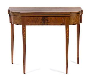 A Federal Mahogany Game Table Height 29 3/4 x width 34 3/4 x depth 35 3/4 inches (open).