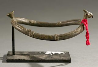 West African brass armlet, 20th century.