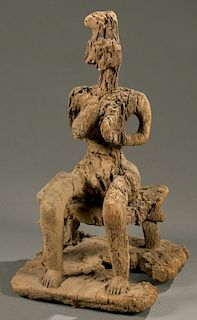 West African seated female figure, 20th c.