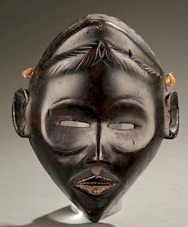West African face mask, 20th century.