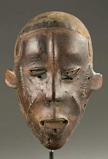 West African skin covered face mask, 20th c.