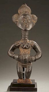 Asante style standing female figure, 20th c.