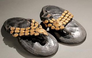 Akan sandals with gold leaf, 20th century.