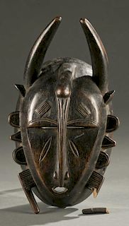 Yaure style horned face mask, 20th c.