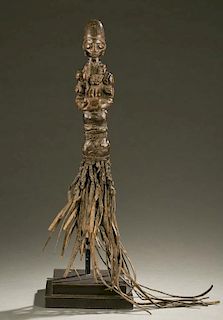Yoruba flywhisk with equestrian figure.