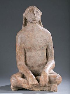 Niger Delta seated clay figure. 15th - 17thc.