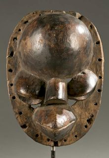 Ibibio wooden face mask, 20th c.