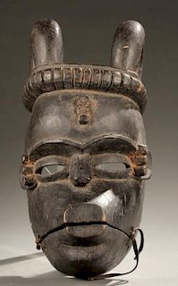 Ibibio horned mask with articulating jaw.