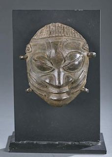 Brass / bronze maskette.