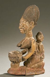 Yoruba maternity figure, 20th century.