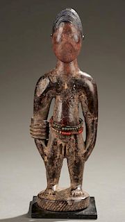 Yoruba Ibeji standing male figure, 20th c.