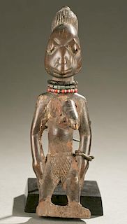 Yoruba female Ibeji figure, 20th c.