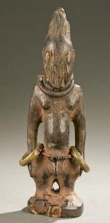 Yoruba male Ibeji figure, 20th c.
