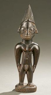 Yoruba male Ibeji figure, 20th c.