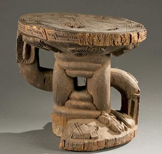 Benin wooden stool, 20th century.