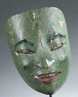 Indonesian green face mask panji theatrical mask.