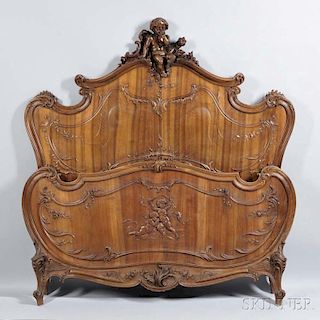 Carved Rococo-style Fruitwood Bed with Putti Motif