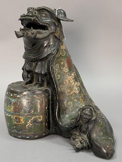 Chinese champleve, enameled, and bronze foo dog figural censor in the form of a parade foo dog costume with long champleve cape stan...