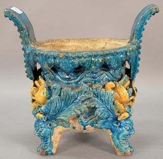 Oriental stoneware footed censer having heavy glazed blue and tan over molded three dimensional dragon and blossoming flowers. ht. 1...