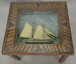 Ship model in shadow box frame made into a coffee table, 19th century. ht. 18 1/2in., top: 23 1/2" x 24 1/2"