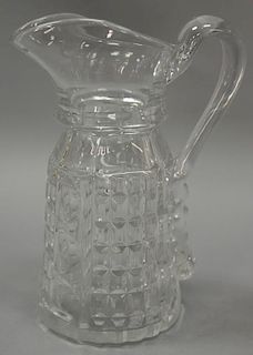 Flint glass Waffle pattern pitcher. ht. 9in.