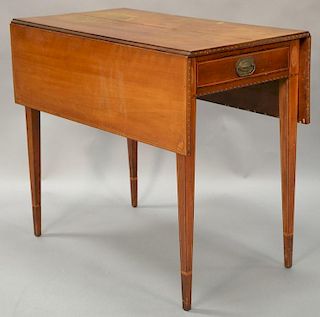 Federal cherry Pembroke drop leaf table with drawer having line, fan and panel inlays, circa 1790, (top cracked and legs ended out)....