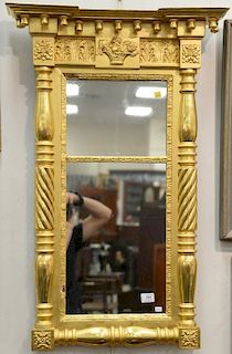 Federal gilt two part mirror with acorn drops, circa 1840 (slight chip on top and bottom frame edge of glass). ht. 38 1/2in., wd. 19...