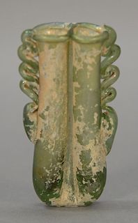 Roman glass Balsamarium having two tubes with looped handles, 2nd-4th century A.D. ht. 4 1/2in.