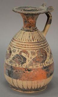 Etrusco-Corinthian black figure Olpe vessel, body decorated with birds and rosettes painted in dark and reddish browns having flared...